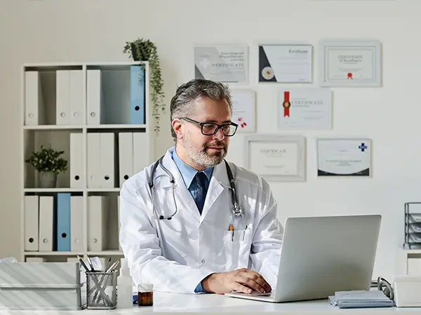 Doctor discussing patient care in a clinic office